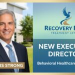 Scott Frankel in professional attire against a neutral background